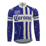 The Corona Beer Retro Cycling Jersey features a distressed blue and white striped pattern, prominently displaying Corona across the chest. It offers a vintage look with an optional fleece-lined finish for warmth.