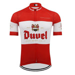The Duvel Beer Retro Cycling Jersey is made from lightweight polyester and features a red and white design with the iconic Duvel logo, MTB Duvelriders on the chest, and Quality Brewers Since 1871. It includes a black zipper, honors Anno 1871, and has short sleeves in a fitted style.