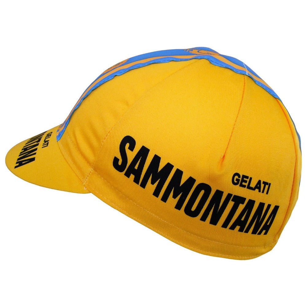 The Gelati Sammontana Retro Cycling Cap displays a classic retro design featuring yellow color, blue accents, and black SAMMONTANA and GELATI text on the side, with a short brim that enhances its distinct style.