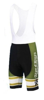 The Alpe DHuez Retro Cycling Bib Shorts feature a classic white upper and green and black lower half. Alpe dHuez is printed vertically on green side panels with vintage white and yellow stripes near the leg openings.