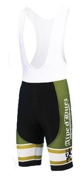 The Alpe DHuez Retro Cycling Bib Shorts feature a classic white upper and green and black lower half. Alpe dHuez is printed vertically on green side panels with vintage white and yellow stripes near the leg openings.