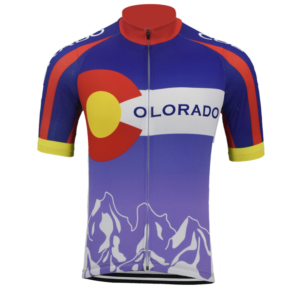 Introducing the Colorado Retro Cycling Jersey, featuring the states iconic flag design with a vintage C logo, red circle, and yellow center. The sleeves display a red and blue pattern, complemented by stylized white mountain peaks on the purple bottom.
