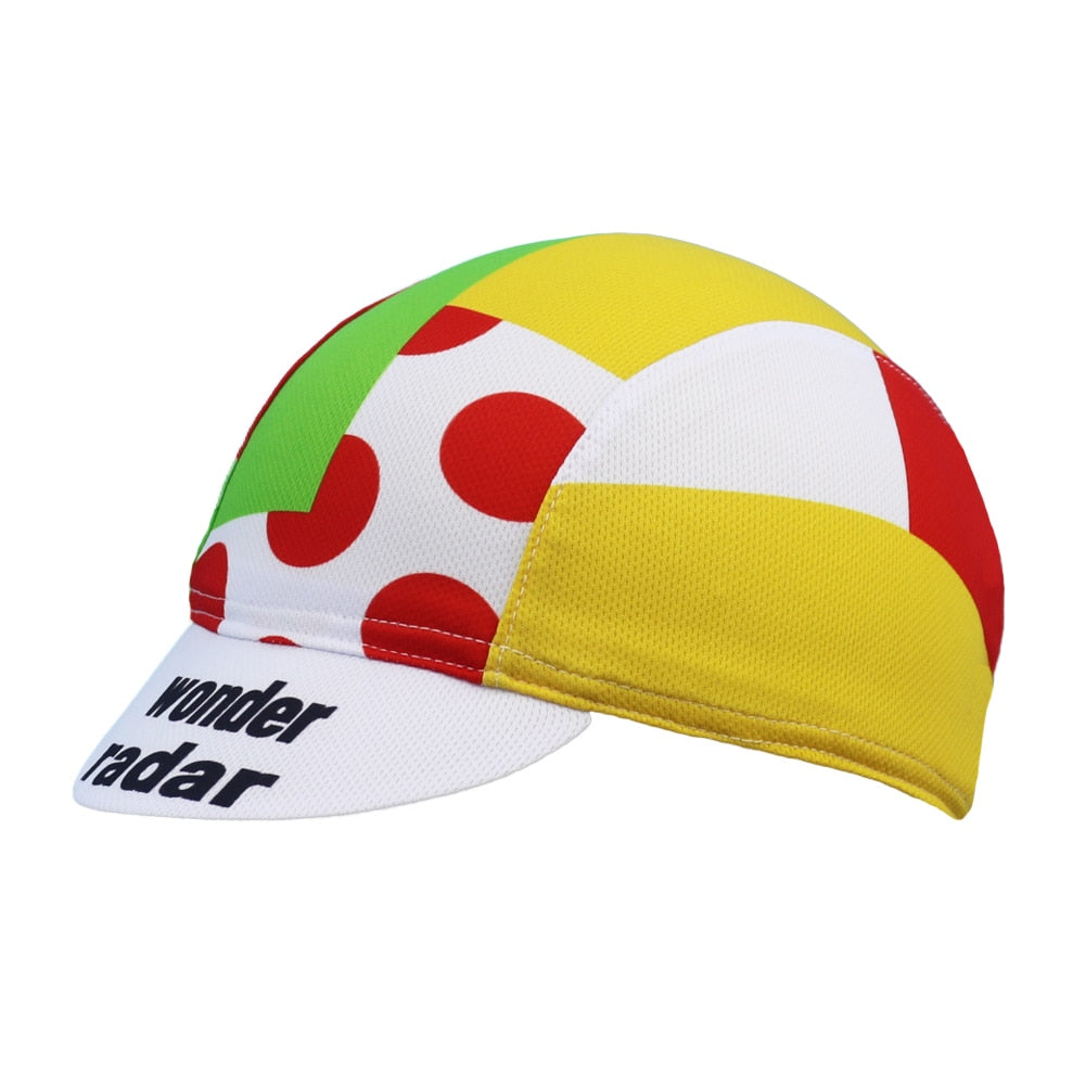 Meet the Wonder Radar Cycling Cap, designed from breathable mesh. This vibrant cap boasts yellow, green, and white panels with red polka dots. Its moisture-wicking design keeps you cool under a white brim featuring bold black wonder radar lettering.