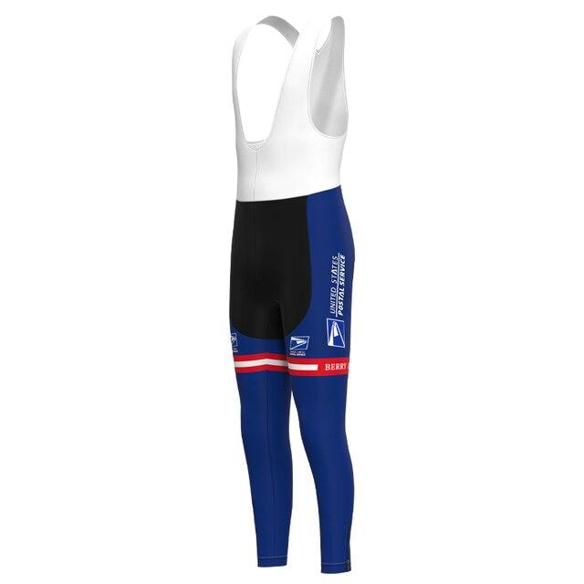 The US Postal Service Pro Team Cycling Leggings feature a white upper, blue and black legs, BERRY text, the USPS logo, red and white stripes for detail, and a gel pad seat for comfort on long rides.