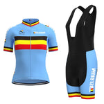 The Womens Belgium Cycling Team Retro Cycling Jersey Set features a light blue retro design with bold black, red, yellow, and white accents. BELGIUM is prominently displayed alongside the striped Belgian flag. The jersey includes a front zipper and short sleeves, perfect for any female cyclist.