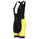 The Womens KAS Canal Retro Cycling Jersey Set features cycling bib shorts with a black upper, a yellow lower, blue hem accents, and CANAL 10 in white on the side. Inspired by the classic KAS Canal Jersey, it offers a sleek, aerodynamic design ideal for enthusiasts.