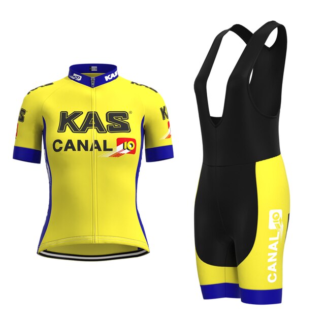 Enjoy a vibrant ride in the Womens KAS Canal Retro Cycling Jersey Set, featuring a yellow jersey and black bib shorts. Accented in blue and red, the jersey displays KAS and CANAL 10, while the bib shorts showcase CANAL 10 with stylish blue trim.
