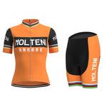 The Womens Molteni Orange Retro Cycling Jersey Set features black and rainbow stripes with Eddy Merckx and ARCORE. Matching sleeves, shorts, and a front zipper complete this standout design.