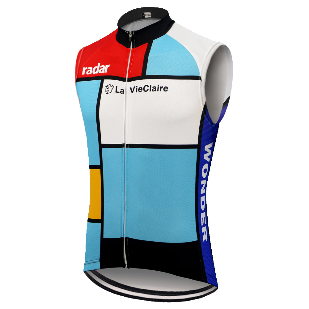 The La Vie Claire Blue Retro Cycling Vest features a Piet Mondrian-inspired design with vibrant red, blue, yellow, and black blocks. It includes Radar, La Vie Claire, and Wonder logos and has a full-length front zipper for a chic look.