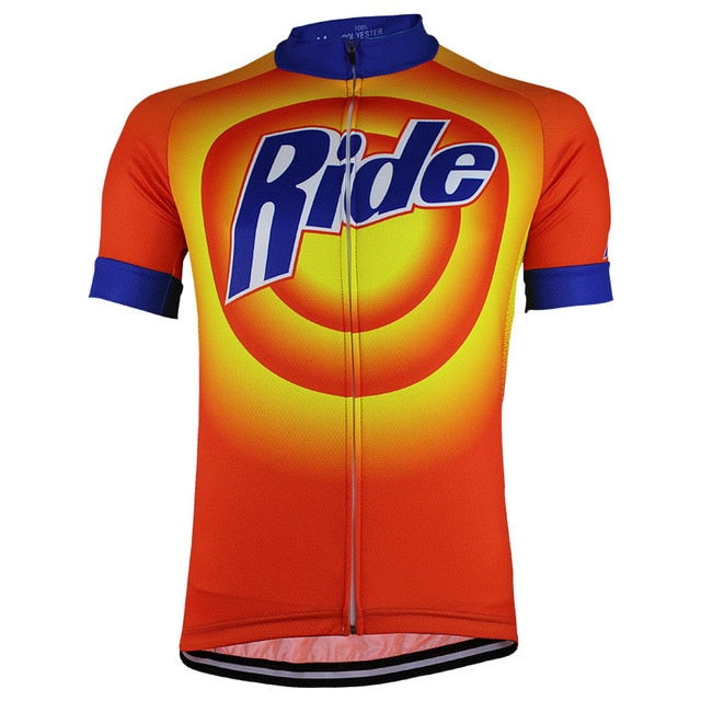 The Ovaltine Ride Cycling Jersey boasts an orange theme with blue sleeves and Ride across the front, set against a vibrant yellow and orange circular design. Made from lightweight polyester for peak performance.