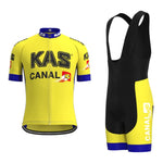 The KAS Canal Retro Cycling Jersey Set includes a yellow and black jersey with KAS and CANAL 10 logos, featuring a front zipper, and bib shorts with straps. The matching set uses breathable fabric adorned with blue accents.