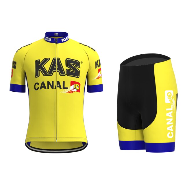 The KAS Canal Retro Cycling Jersey Set features a breathable yellow short-sleeve jersey with blue and white accents, a front zipper, and KAS and CANAL 10 logos. It includes black shorts with yellow sides showcasing the bold white CANAL 10 text.