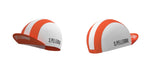 The San Pellegrino Retro Cycling Jersey Set features two white cycling caps, each with a bold orange stripe and S. Pellegrino printed on the side. One cap is shown from the front and the other from the back against a white background.