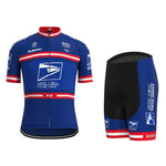 Discover the US Postal Service Short Sleeve Pro Cycling Team Jersey Set, inspired by Lance Armstrong. This dark blue set features red and white stripes and logos for Subaru, Berry Floor, and the US Postal Service. The shorts perfectly mirror this iconic design.