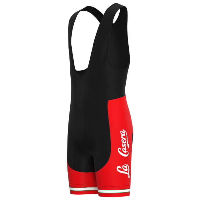 The La Casera-Bahamontes Retro Cycling Jersey Set features black and red bib shorts with La Casera in white text on the sides, accentuated by retro-inspired red bands with white stripes at the hem, celebrating a performance-driven legacy.