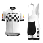 The Classic 1960s Peugeot Retro Cycling Jersey Set includes a white short-sleeve jersey and bib shorts. The jersey features a vintage black and white checkerboard with PEUGEOT text, echoing the classic style, while the bib shorts carry the same text and a Shell logo on the sleeves.