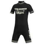 The Paris-Roubaix Retro Cycling Jersey Set is a black suit with Paris-Roubaix and Alcyon in vintage font, featuring short sleeves, a breathable gel seat pad, and striped cuffs and collar, epitomizing performance cycling wear.