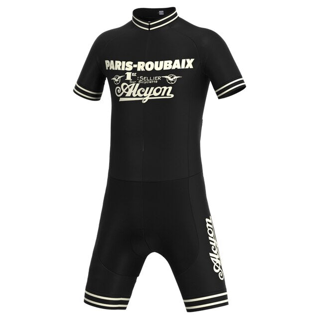 The Paris-Roubaix Retro Cycling Jersey Set is a black suit with Paris-Roubaix and Alcyon in vintage font, featuring short sleeves, a breathable gel seat pad, and striped cuffs and collar, epitomizing performance cycling wear.