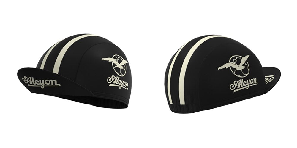 Two black cycling caps, part of our Paris-Roubaix Retro Cycling Jersey Set and performance line, showcase white stripes and a bird-in-flight logo. Each peak bears the name Alayon. Both are displayed from various angles with similar designs.
