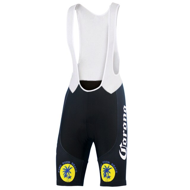 The Corona Beer Retro Cycling Jersey Set includes cycling bib shorts with white suspenders and a dark blue base. The right leg displays Corona in white, while the thighs feature circular logos with yellow backgrounds and palm tree graphics saying Find Your Beach. A gel seat pad ensures comfort.
