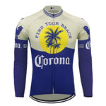 The Corona Beer Retro Cycling Jersey, offering a fleece option, features long sleeves and a vibrant design with a yellow sun, palm trees, Find Your Beach, and the bold Corona logo, making it ideal for style and comfort while cycling.