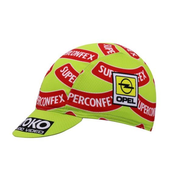 The YOKO Superconfex Retro Cycling Cap is yellow with a short brim, featuring red YOKO Superconfex logos, a black patch with the Opel logo, and a smaller vintagecycling.shop patch.