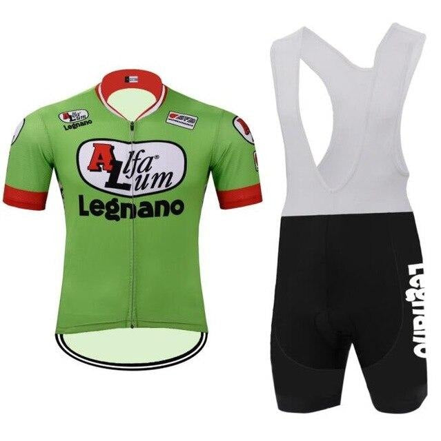 The Alfa Lum Legnano Retro Cycling Jersey Set includes a green jersey with red and white accents, iconic logos, and black bib shorts made from breathable fabric. The shorts feature white straps and side text, offering a stylish and comfortable cycling experience.