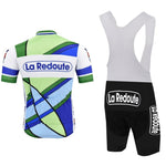 The La Redoute Retro Cycling Jersey Set includes a geometric pattern in green, blue, and white and breathable shorts. The set is styled with the La Redoute logo on the back, offering both classic style and modern performance.