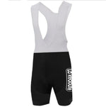 The La Redoute Retro Cycling Jersey Set includes breathable cycling bib shorts with a black lower half and white straps, featuring La Redoute in white on the left side, combining style and comfort for any ride.