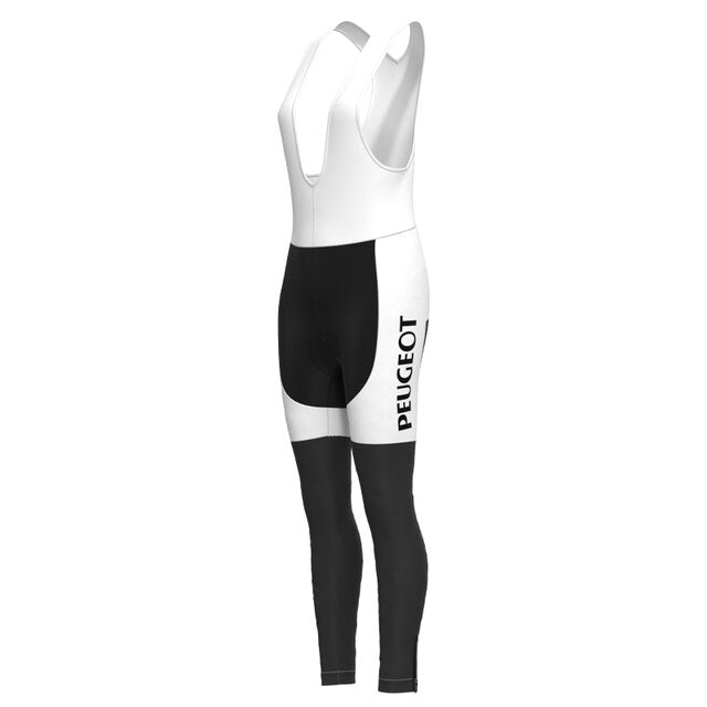 White and black cycling bib tights, featuring PEUGEOT vertically, evoke a classic retro style. The top section is white with straps, while the bottom has long black and white leggings, reminiscent of the Womens 1960s Peugeot-Shell Retro Cycling Jersey Long Set.