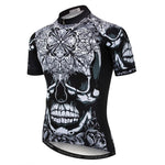 Introducing the Black-White Patterned Skull Cycling Jersey by Weimostar, featuring short sleeves and an intricate skull and floral design. Made of lightweight polyester for peak performance, it sports Weimostar branding on the sleeves and hem.