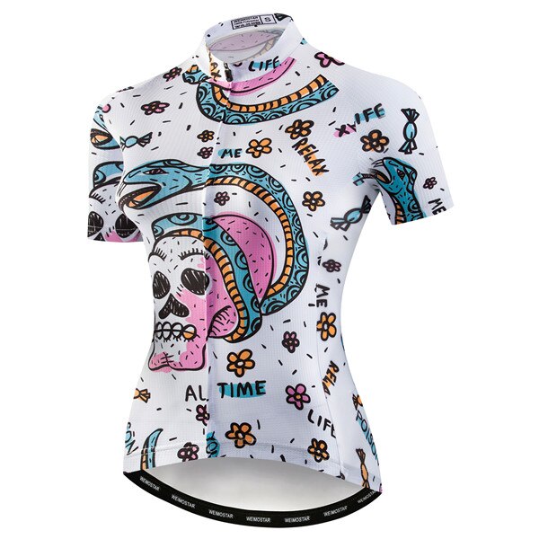 Womens Snake & Skull Cycling Jersey: This eye-catching garment features an edgy design with skulls, flowers, and bold phrases like REAL LIFE and TIME, set against a white background with black, pink, blue, and orange details.