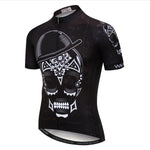 Explore the Hat and Skull Cycling Jersey from WEIMOSTAR, a lightweight polyester performance jersey featuring a Day of the Dead skull with intricate patterns, a bowler hat, and floral motifs, plus branded embellishments on the arms and lower front.