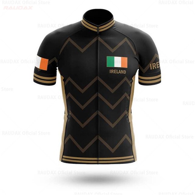 The Ireland Pro Cycling Team Jersey features a black and gold chevron design with an Irish flag on the left chest and sleeve. IRELAND is displayed on the right, made from lightweight polyester, and includes a full-length front zipper for easy use.