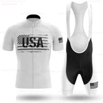 The USA White Cycling Team Jersey Set includes a short-sleeve jersey with a striking USA flag and USA design, paired with bib shorts featuring a small flag on one leg and a gel seat pad for extra comfort. Made from lightweight polyester, this outfit is perfect for cycling enthusiasts.