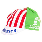 The Brooklyn Retro Cycling Caps feature a classic design with red and white stripes on one side and solid green on the other, adorned with BROOKLYN on the brim as an homage to Brooklyn Chewing Gum, plus a stylized bridge graphic for extra flair.