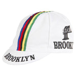 The Brooklyn Retro Cycling Cap features a white base with five vivid stripes (blue, red, yellow, green, black), Brooklyn and a silhouette on the side and brim. Its a nod to the iconic Brooklyn Chewing Gum era.