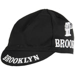 The Brooklyn Retro Cycling Caps showcase Brooklyn in bold white on the brim and side, paired with a classic bridge graphic. Its ideal for those wanting a timeless blend of history and style.