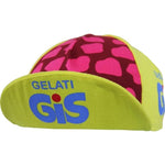 The GiS Gelati Retro Cycling Cap features a bright yellow base with a pink and dark red pattern. It showcases a classic retro design with GiS Gelati in blue and red on the brim and sides, embodying timeless cycling style.