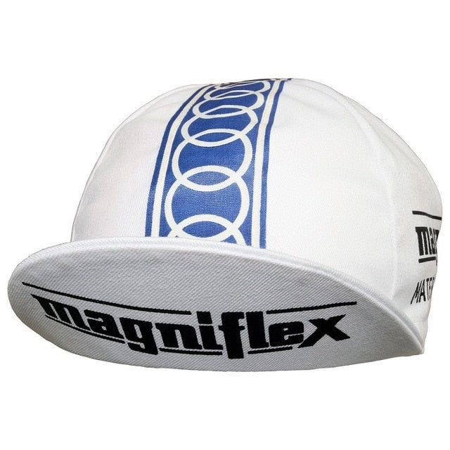 The Magniflex Retro Cycling Cap showcases a classic design with a white base and intertwined blue rings, featuring magniflex boldly on the brim and sides.