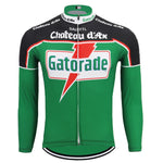 The Chateau dAx Gatorade Retro Cycling Jersey features a green, long-sleeve design with a prominent white and red Gatorade logo on the front, black shoulders and collar adorned with Chateau dAx in white, and a full-length front zipper for a sleek fit.