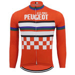 The Peugeot A.V.C. Nimes Retro Cycling Jersey, in vibrant orange with long sleeves, features PEUGEOT and A.V.C. NIMES on the front, horizontal stripes in white, black, blue, red, and a classic checkerboard pattern at the bottom.