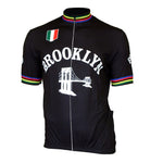 The Brooklyn Chewing Gum Bridge Retro Cycling Jersey Set features a retro black design with a bridge graphic and bold Brooklyn lettering. Multicolored stripes on the sleeves and collar, along with an Italian flag on the chest, evoke the classic era linked to Roger de Vlaeminck.