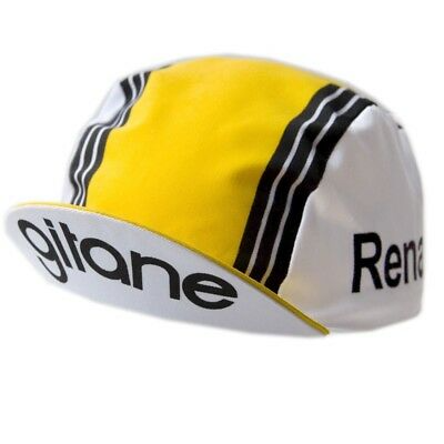 The Renault Gitane Retro Cycling Cap features a classic design with a yellow and white color scheme, black center stripes, and Renault and Gitane on the brims sides, embodying vintage cycling style.