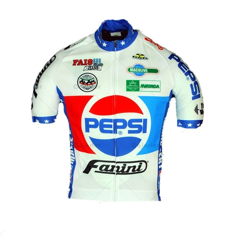 The Pepsi Fanini Retro Cycling Jersey Set is crafted from lightweight polyester, showcasing the iconic Pepsi Fanini logo at the center with smaller Macolive and Mirinda logos. It features blue and red accents, with stars on the sleeves and collar for a classic retro vibe.