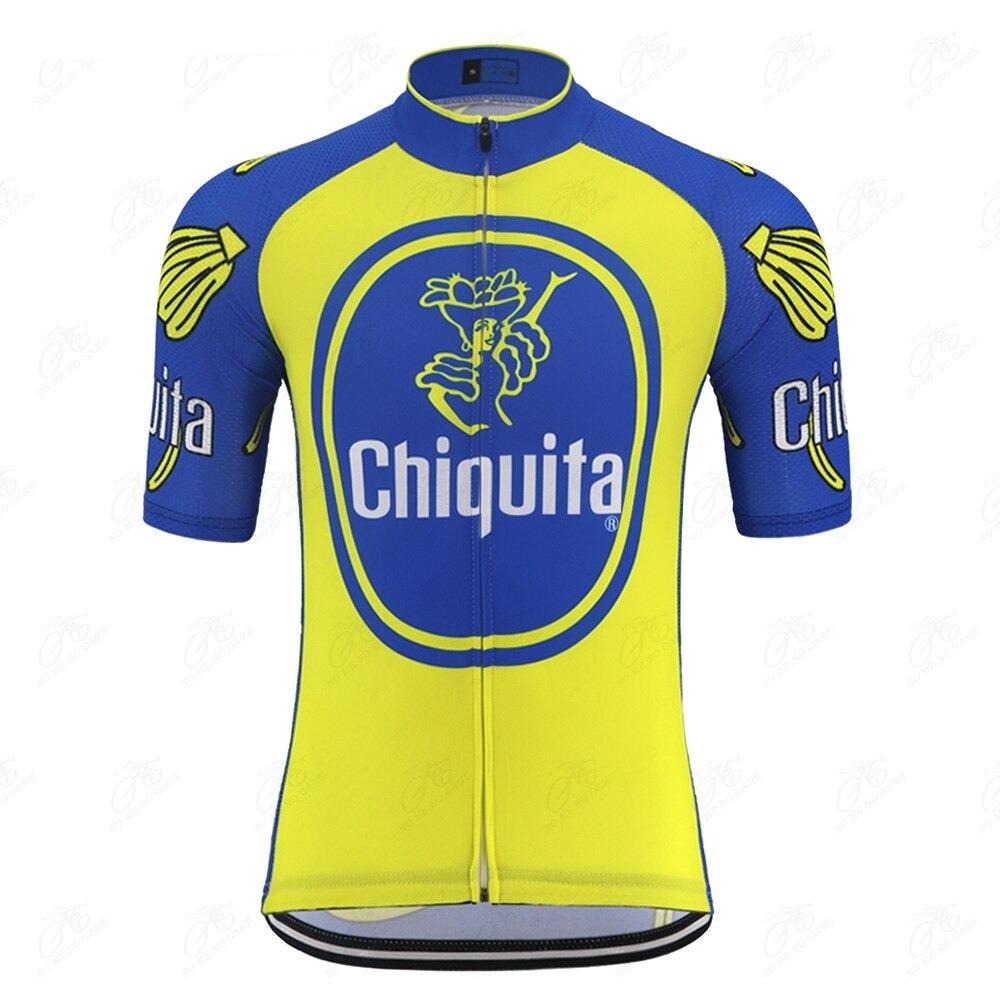 The Chiquita Banana Cycling Jersey features a vibrant yellow and blue design with banana graphics on the sleeves and the Chiquita emblem in a large blue oval on the front, crafted from performance fabric.