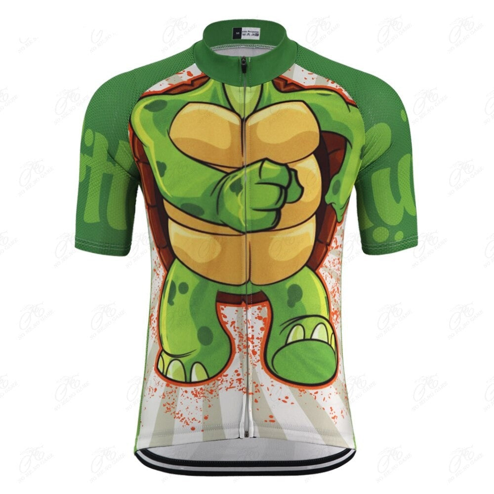 The Ninja Turtle Cycling Jersey is green and white, made of high-performance polyester, and features a cartoon turtle design on the front with abstract patterns and orange splashes.