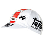 The Teka Fregaderos Retro Cycling Cap features bold black text, red and black geometric logos, and a classic retro look that captures a vintage cycling team aesthetic.