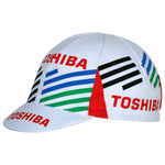 Vintage cycling enthusiasts will love the Toshiba 1990 Retro Cycling Cap, featuring colorful geometric stripes in blue, green, black, and red. The classic design is enhanced with TOSHIBA in bold red text, offering a nostalgic touch to the retro style.