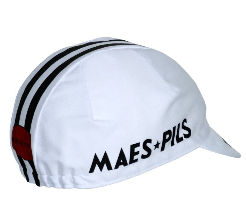 The Watney Beer Retro Cycling Cap is white with two black center stripes and MAES P*ILS on the side. A partially visible red circle with black text enhances its vintage style.